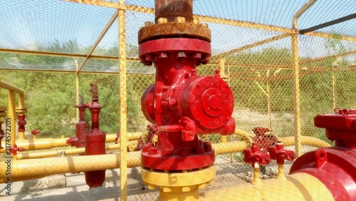 Close Up View Of Red Industrial Gas Valve And Pipeline