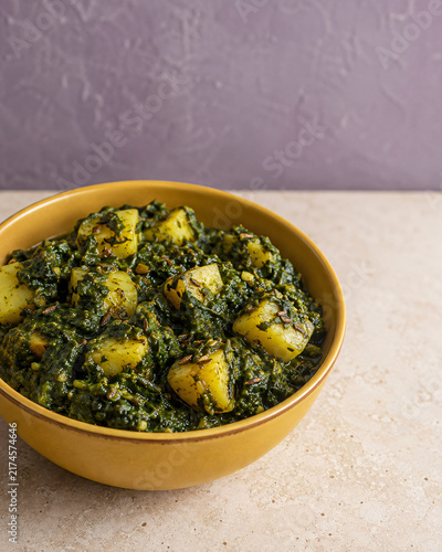 Indian Saag Aloo Spinach and Potato Curry with Aromatic Spices