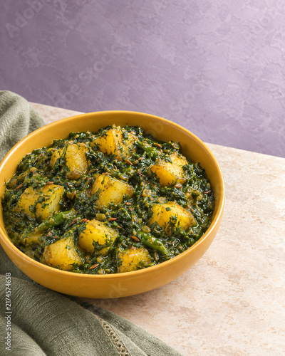 Indian Saag Aloo Spinach and Potato Curry with Aromatic Spices