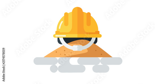 A vector illustration of a yellow construction helmet sitting on a pile of sand with gray foundation blocks below.