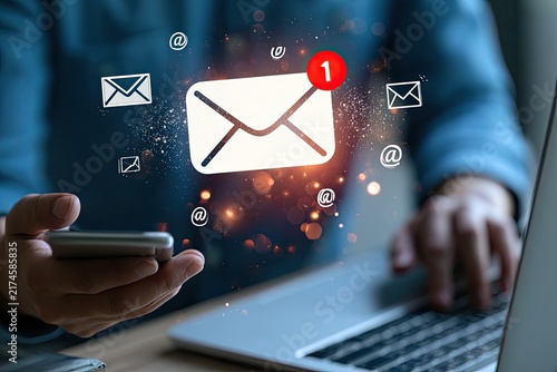 Digital Communication Concept - Email and Messaging Icons Floating Above Devices.