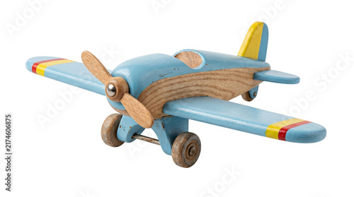 Vintage wooden toy airplane with blue wings. Handcrafted timber aircraft model. Retro miniature plane for nursery decor and childhood play.