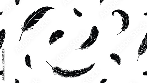 Seamless pattern background with black bird feathers floating on a plain white backdrop for creative design and textile prints
