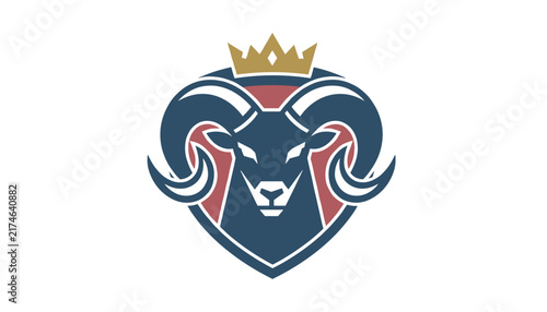 Powerful sports mascot logo featuring a blue ram head inside a shield under a golden crown illustrating authority and strength.
