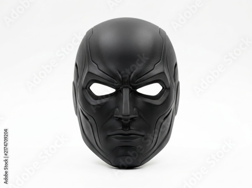 Mysterious Black Mask with Glowing White Eyes on White Background.