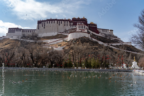 Canvas Print Potala Palace overlooking a lakeside park in Lhasa Tibet