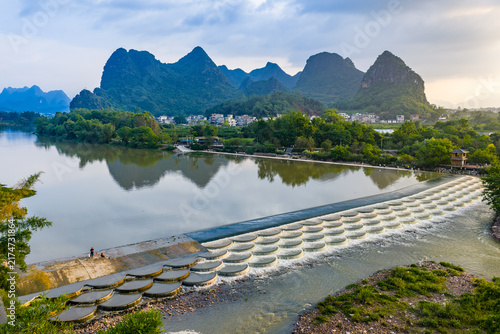Karst Mountains and Fish Scale Weir on River in Guilin, Guangxi, China