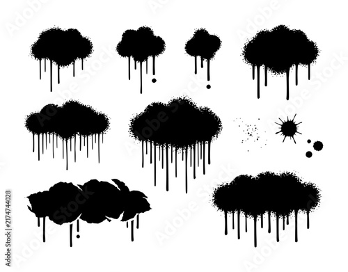 Collection of black spray paint graffiti clouds with dripping paint effects isolated on a white background