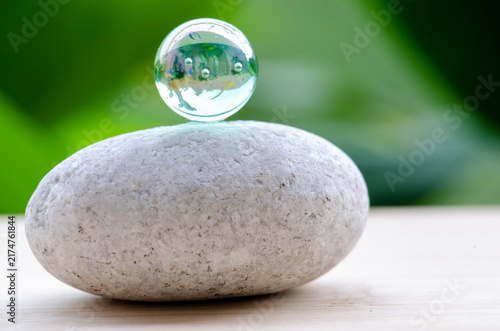 Canvas Print Marble on top of zen stone representing balance and calmness, with customizable space for text