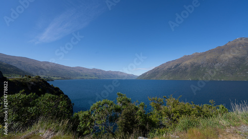 Canvastavla Lake Wanaka, New Zealand - Scenic View of Mountains and Water