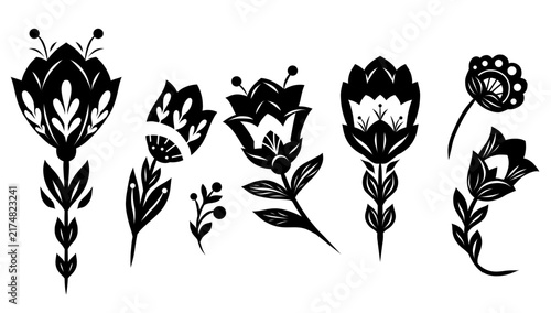 Vector monochrome set of flowers clip arts in folk art style. Collection of black silhouette of tracery floral illustration f