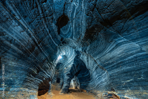 Bild auf Leinwand Striated Blue Cave Ceiling with Layered Rock Formations at Tham Si Fa Phutthakha