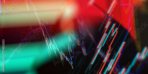 Abstract financial stock market background. Dynamic trading charts and candlestick graphs with digital glitch effect on screen