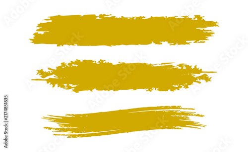Golden brush strokes set with paint stripe texture