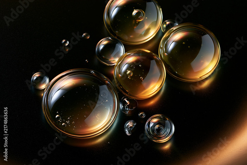 Fototapeta kuchenna Olive oil droplets under spectral light on black ceramic showcasing food authenticity testing premium laboratory science and luxury editorial styling