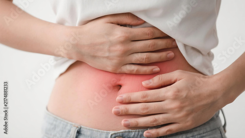 Pelvic pain stomachache concept. Hands of young woman on stomach as suffer on menstruation cramp, indigestion,gastrointestinal,diarrhea problem