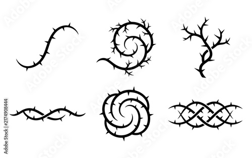 A collection of black thorny vine silhouettes isolated on a white background perfect for spooky halloween designs and gothic style decorative elements for your projects