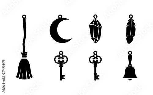 A collection of black silhouette icons featuring mystical items like a broom moon crystal feather keys and a bell perfect for a spooky halloween design