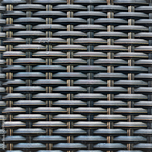 Obraz na plátně Black woven rattan synthetic wicker texture background with synthetic background