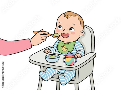A happy baby in a high chair being fed green pureed food by an adult's hand.