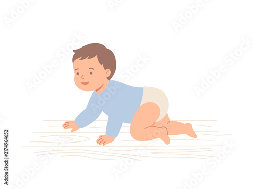 A cute baby wearing a blue shirt and white diaper crawls on a light wooden floor, looking forward with a gentle smile.