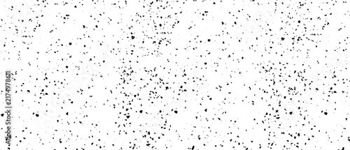 Fotografie Sparse black grunge texture with scattered irregular ink specks and distressed f