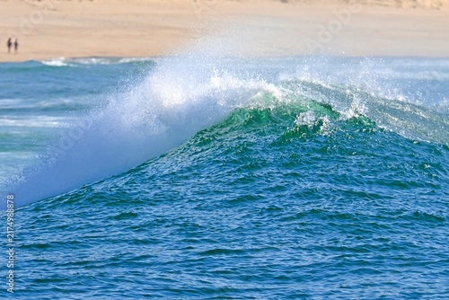 Photography A powerful ocean wave with crystal-clear spray, ready for water sports