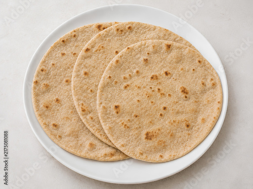Round Wheat Chapatis Layered for a Simple South Asian Meal