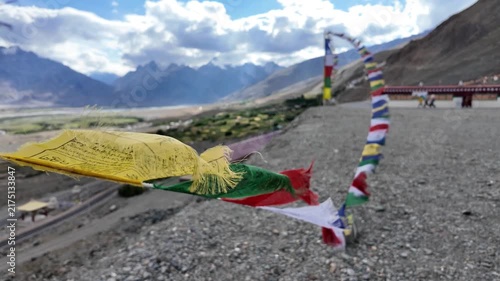 buddhist colourful tibtan praying flags waving in the wind in the Himalaya