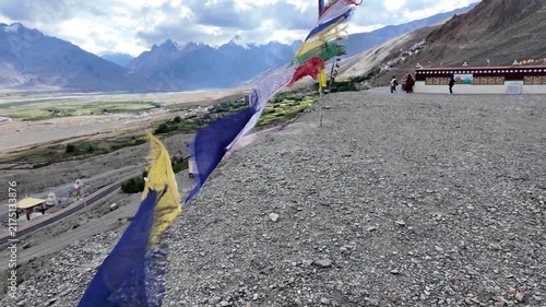 buddhist colourful tibtan praying flags waving in the wind in the Himalaya