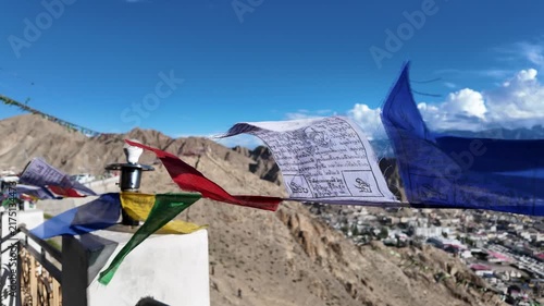 buddhist colourful tibtan praying flags waving in the wind in the Himalaya