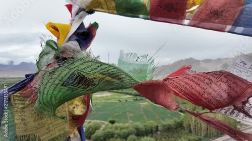 buddhist colourful tibtan praying flags waving in the wind in the Himalaya