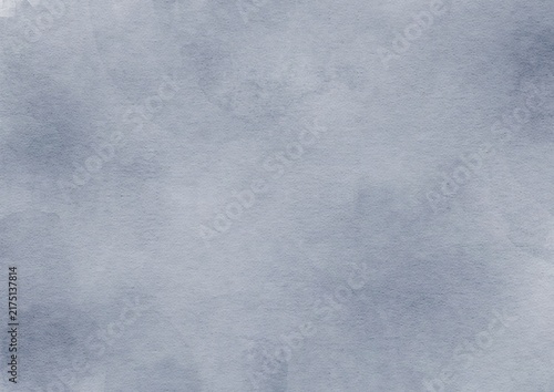 Soft dusty blue watercolor texture with cloudy organic washes and subtle paper grain. Calm atmospheric background for branding, stationery, packaging and contemporary design.