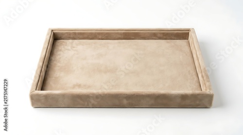 Empty beige velvet jewelry display tray for retail store organization and luxury storage.