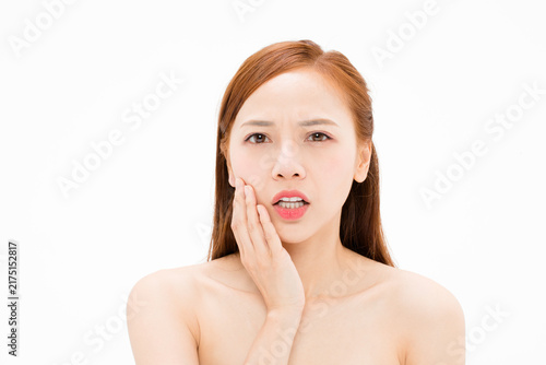 Foto Young woman with toothache touching cheek in pain on white background