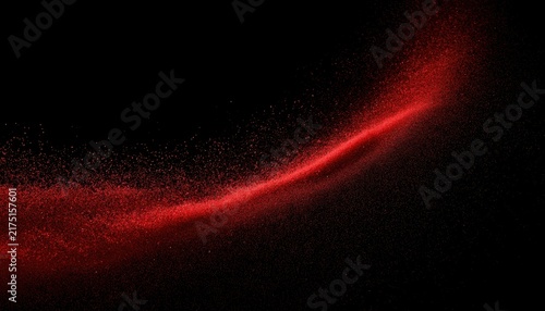 A sweeping arc of fine red dust particles floating against a solid black backdrop