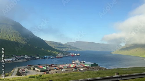 Landscape of Faroe Islands in Summer. View through window from Moving Vehicle. 