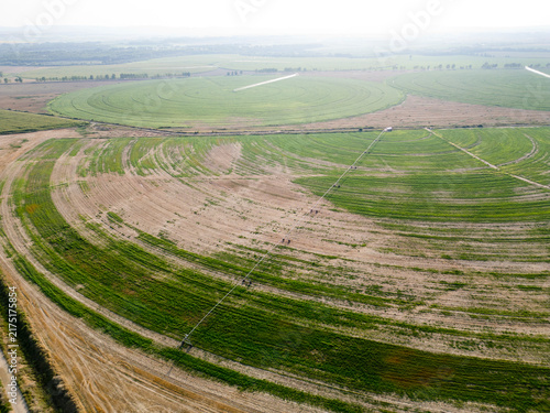 Фотография Aerial View of Circular Irrigated Agricultural Field Near Curbe, Huesca, Spain