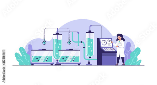 Female scientist monitoring aquaculture laboratory with fish tanks and equipment