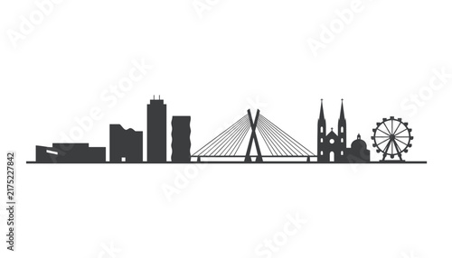 Minimalist black silhouette of a modern city skyline showing tall skyscrapers, a suspension bridge, and a Ferris wheel.