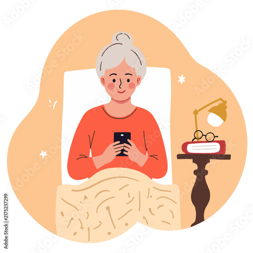 Older woman using smartphone while sitting in bed at home. Elderly set  