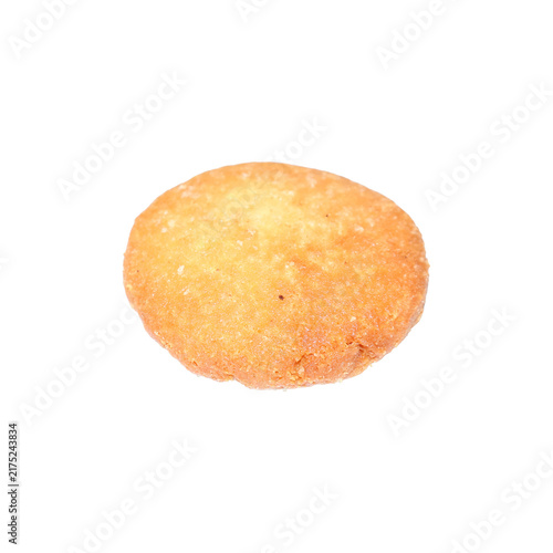 Single golden fried breaded patty isolated on a plain surface with soft lighting