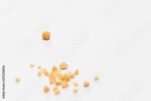 Kidney stones and mineral fragments isolated on a white background with copy space.