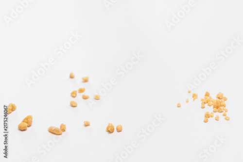 Multiple kidney stones isolated on a white background with copy space.