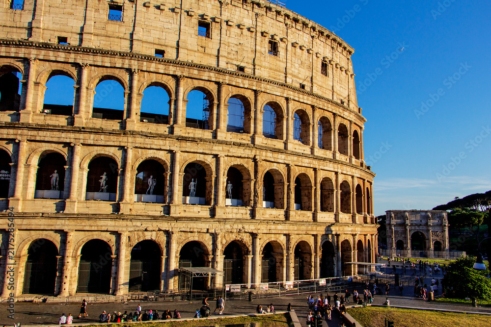 Fototapeta premium The Roman Colosseum and the Arch of Constantine, Rome, Italy