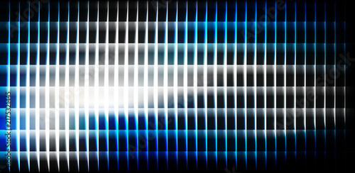 Abstract blue and white digital grid background with glowing vertical light lines.