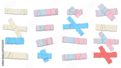 Set of various colorful adhesive tape strips with rough edges in blue, pink, and beige colors isolated on a dark black background for