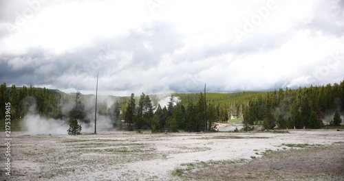Natural hot spring surrounded by mountains and wilderness