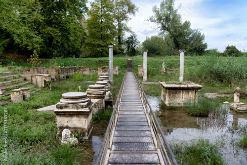 Canvastavla The flooded Sanctuary of Isis with metal visitor walkway at the Archaeological Park of Dion
