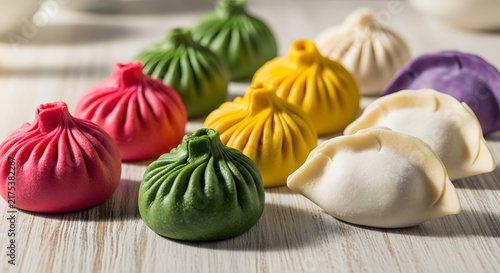Colorful steamed dumplings assortment on a wooden surface transparent background